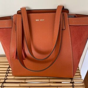 Nine West orange polyester, spandex and polyvinyl chloride pocketbook
